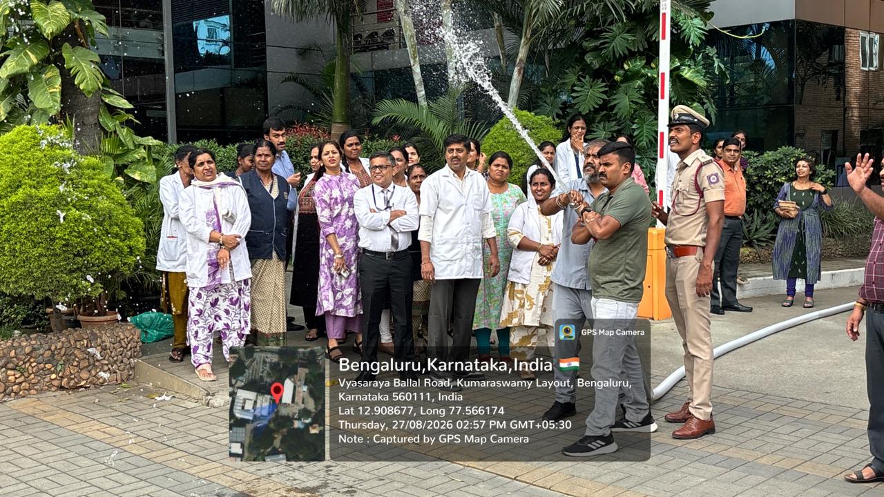 Water hose drill demonstration conducted by fire safety personnel